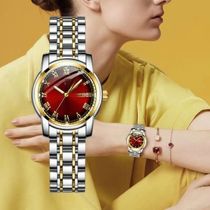 Close-up of ORUSS quartz watch featuring a red dial and dual calendar display function