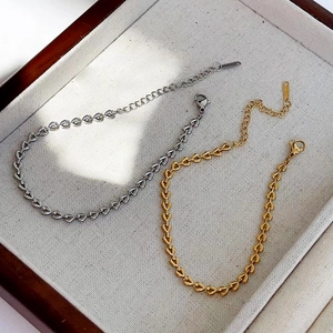18k gold plated heart-shaped woven link bracelet set in gold and silver stainless steel
