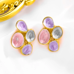 Enamel drop earrings with irregular colorful swirl design and gold plated metal finish