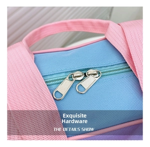 Exquisite silver metal double zippers and fabric texture of the blue and pink bag