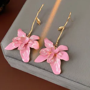 Vintage style pink orchid floral drop earrings with gold branch-shaped metal hooks