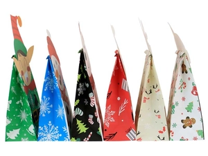 Detail of Christmas food paper bags with cartoon seals and festive holiday patterns