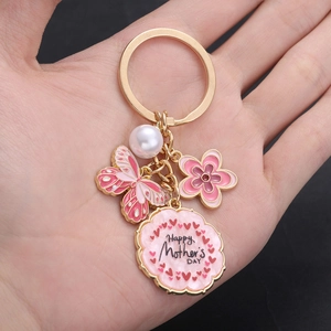Pink butterfly and flower keychain with Happy Mother's Day charm and white pearl