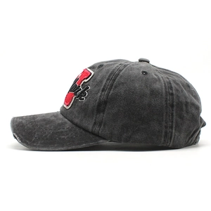 Detailed view of 3D York embroidery on charcoal vintage washed cotton baseball cap