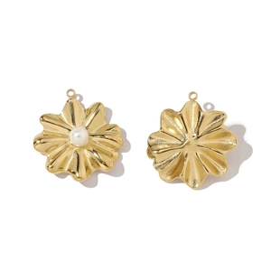 Detail of two-tone daisy and rose flower charms in stainless steel with a pearl inlay