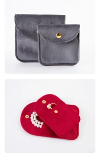 Detailed velvet jewelry pouch with snap button for storing rings and necklaces