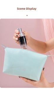 Detail of mint green PU leather cosmetic bag with gold zipper and LOVE print