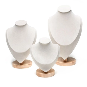 Three-piece solid wood and cream velvet bust stands for necklace and jewelry display