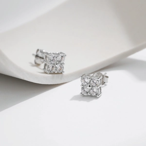 Elegant s925 silver square cluster moissanite stud earrings on a minimalist white stand