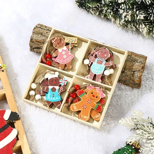 Detail of four cartoon gingerbread man wooden ornaments in a grid box with rustic hemp rope