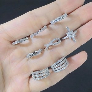 Set of eight silver-colored non-piercing cartilage ear cuffs with sparkling cubic zirconia