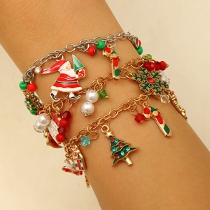 Christmas charm bracelet for women with snowflake Santa and reindeer pendants on OT clasp