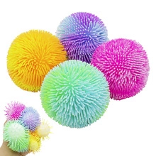 Close-up of colorful squishy puffer balls stress relief sensory toys for kids