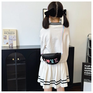 Kids' black sequin crossbody bag with LOVE pattern and colorful striped strap on back