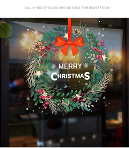 Detail of Christmas wreath static window sticker with holly, pinecones and berries