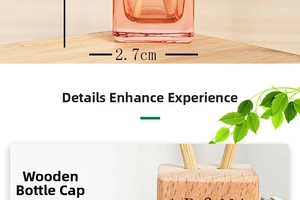 Detail of pink glass car perfume bottle with a natural wooden cap and vent clip attachment