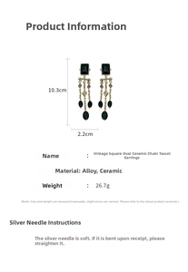 Detail view of vintage black ceramic tassel earrings with dimensions 10.3cm and alloy specs
