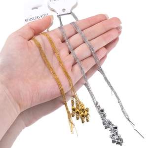 Adjustable 45cm stainless steel necklace chain in gold and silver finish shown on palm