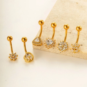 Set of 6 gold plated stainless steel navel rings with cubic zirconia geometric designs