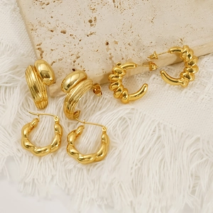 Three-pair gold plated stainless steel earring set with twisted and textured hoop designs