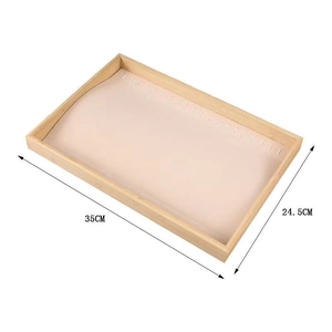 Bamboo jewelry display tray for necklaces and bracelets with dimensions 35x24.5cm