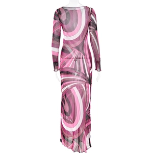 Close-up of fitted long sleeve dress featuring colorful swirl print on sheer fabric