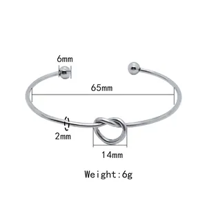 Minimalist stainless steel open heart knot bangle with dimensions and 6g weight details
