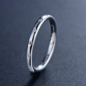 Minimalist S925 sterling silver ring featuring multiple small round inlaid gemstones