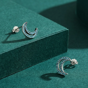 Elegant S925 sterling silver crescent moon stud earrings with micro-set turquoise stones