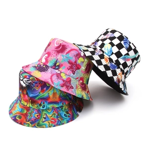 Double-sided cotton sun hats featuring vibrant graffiti, abstract, and checkerboard prints