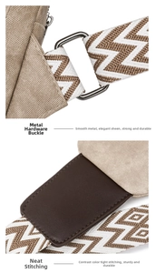 Detail of corduroy bag with woven strap, metal hardware, and contrast stitching quality
