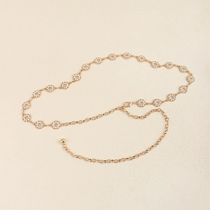 Elegant gold metal waist chain belt with sparkling rhinestones for beach or fashion outfits