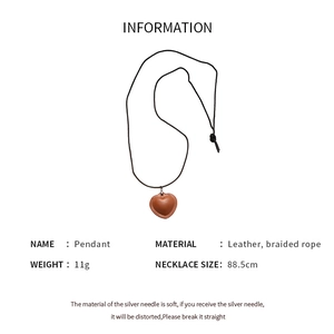 Detailed size and material specification chart for the leather heart pendant necklace