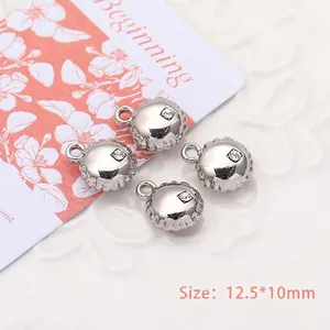 Detail of silver crown pendants with rhinestones, sized 12.5x10mm for DIY jewelry making