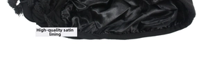 Detailed macro view of high-quality black satin lining and elastic hem for hair protection