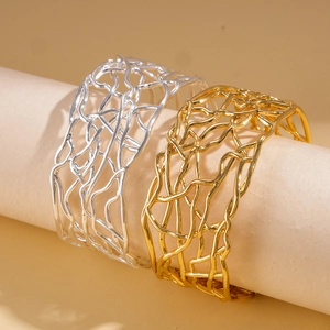 Modern 18K gold and silver plated open bangles with unique interlaced hollow design