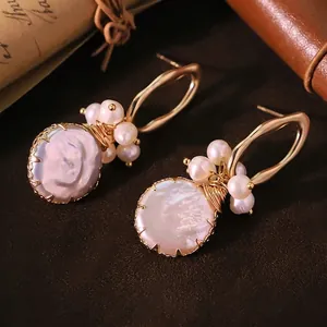 Elegant natural freshwater pearl drop earrings with handmade gold wire wrapping
