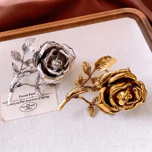 Exaggerated vintage rose flower double-finger ring in gold and silver finish