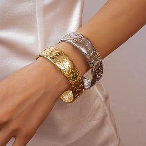 Oval open bangles in gold and silver with vintage embossed floral patterns for women