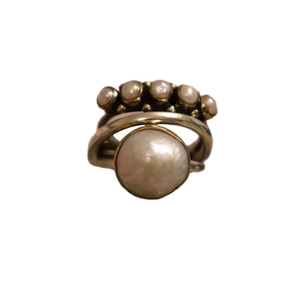 Vintage style multi-pearl open ring with large central pearl and diamond accents