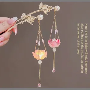 Luminous lotus flower tassel hair stick in gold finish with pink gradient light