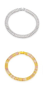 Detail of silver and gold tennis bracelets with rectangular zircon stones and clasps
