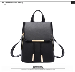 Front view of black PU leather backpack with gold metal trim and drawstring flap detail
