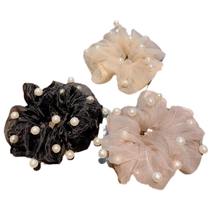 Three-piece set of sheer organza scrunchies with white pearls in black, cream, and pink