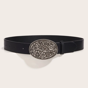 Vintage black leather belt featuring an ornate silver oval buckle with floral engravings