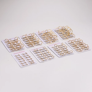 Set of 18K gold-plated stainless steel hoop earrings on professional display cards