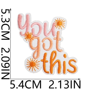Macro shot of You Got This embroidery patch with sun motifs and size measurements