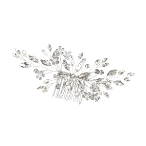 Detailed view of silver bridal hair comb with crystals and pearls on white background