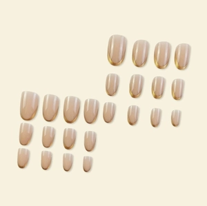 24pcs almond nude pink press-on nails with elegant gold metallic French tips design