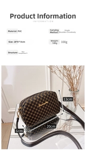 Detailed view of dark brown monogram PVC crossbody camera bag with gold hardware